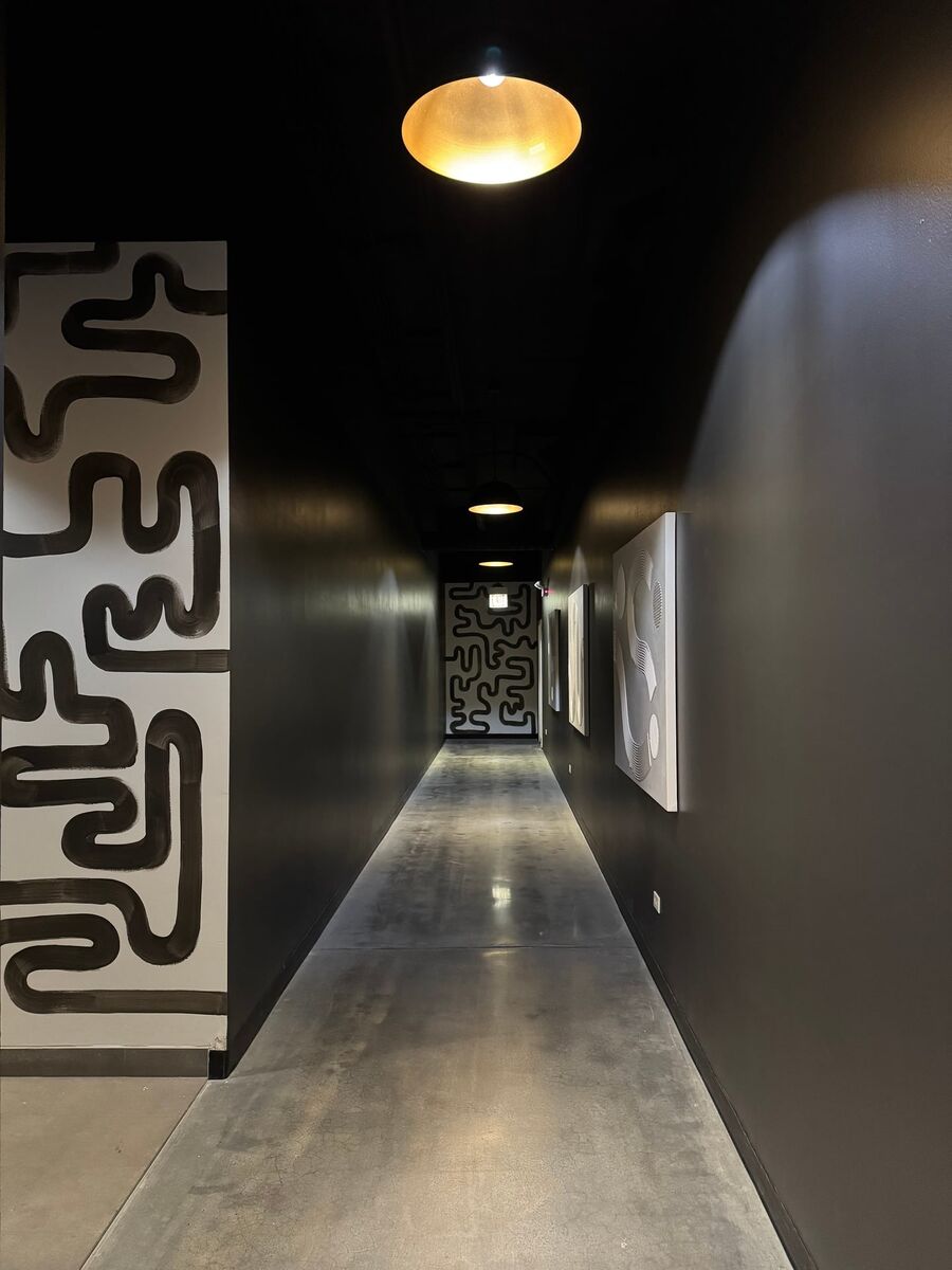 Commercial corridor with dramatic accent lighting