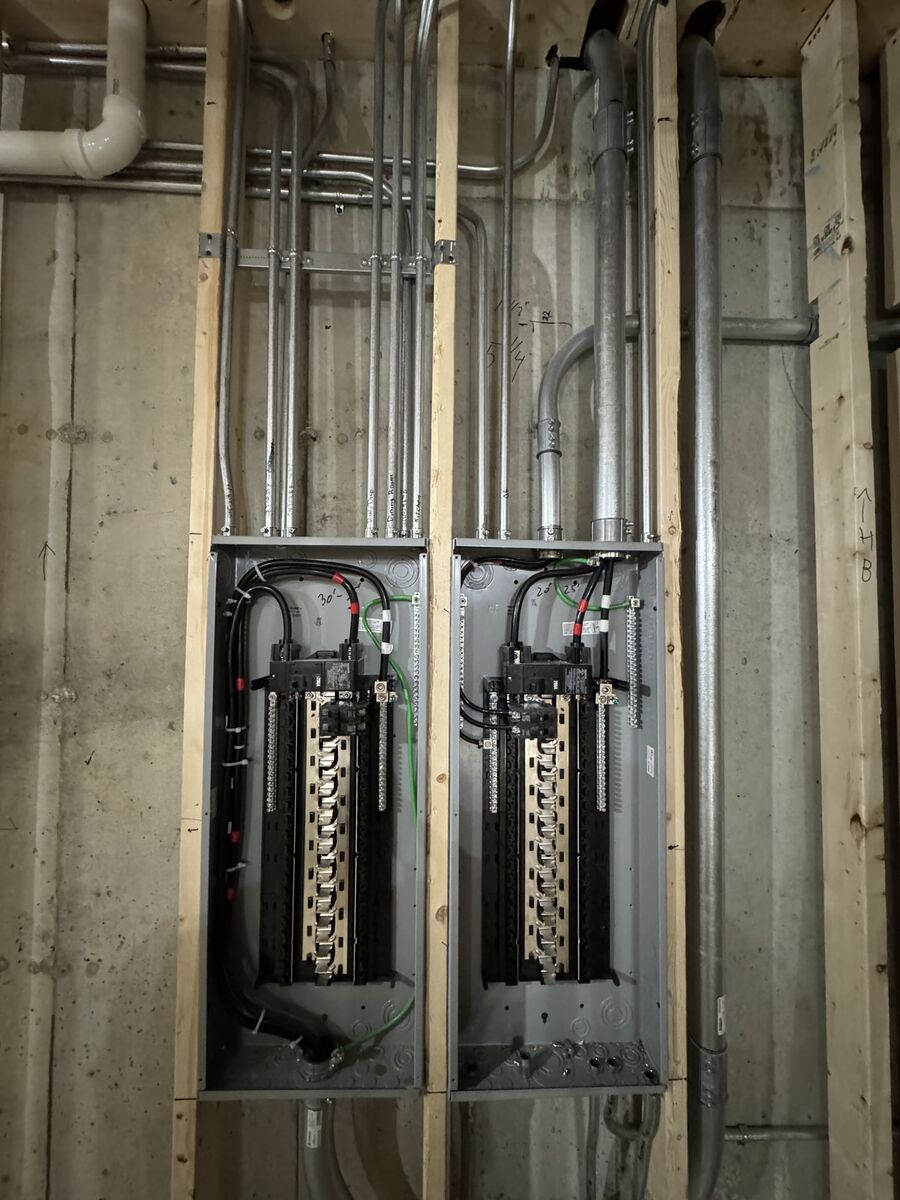 New electrical wiring and conduit runs installed by Peak Property Electric