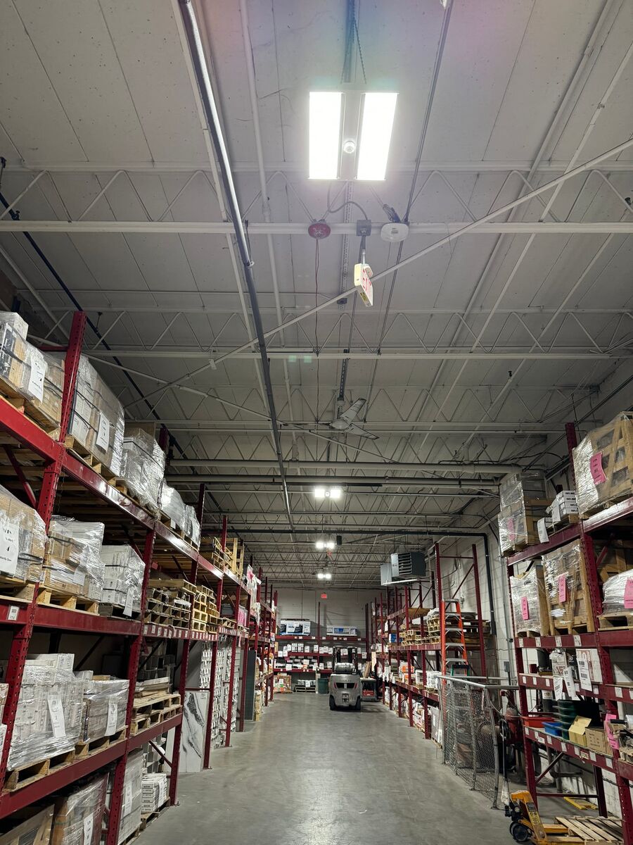 Commercial warehouse high-bay lighting installed by Peak Property Electric